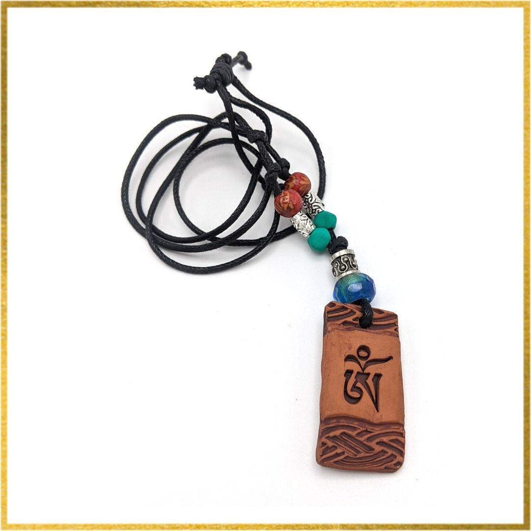 Handmade Sacred Earth Pendants with Seed Syllables