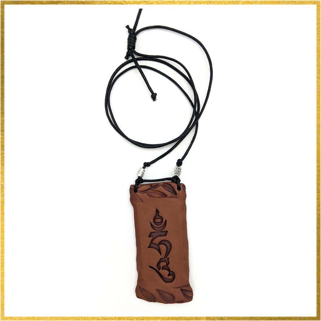 Handmade Sacred Earth Pendants with Seed Syllables